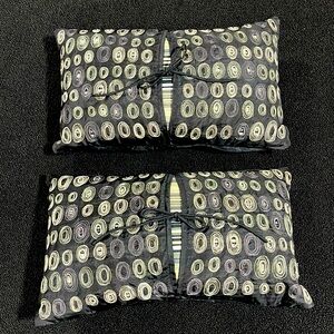 Pair of Pier 1 pillows, black, white, beige, and grays.